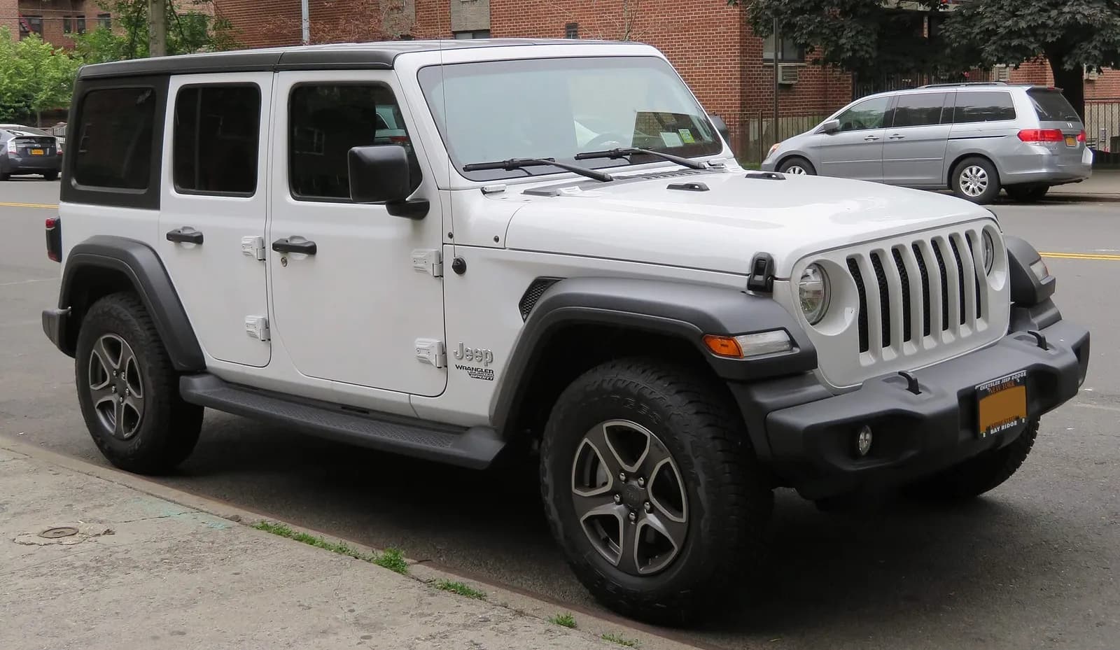 2018 Jeep Wrangler Unlimited Sport four-door, front three-quarter view