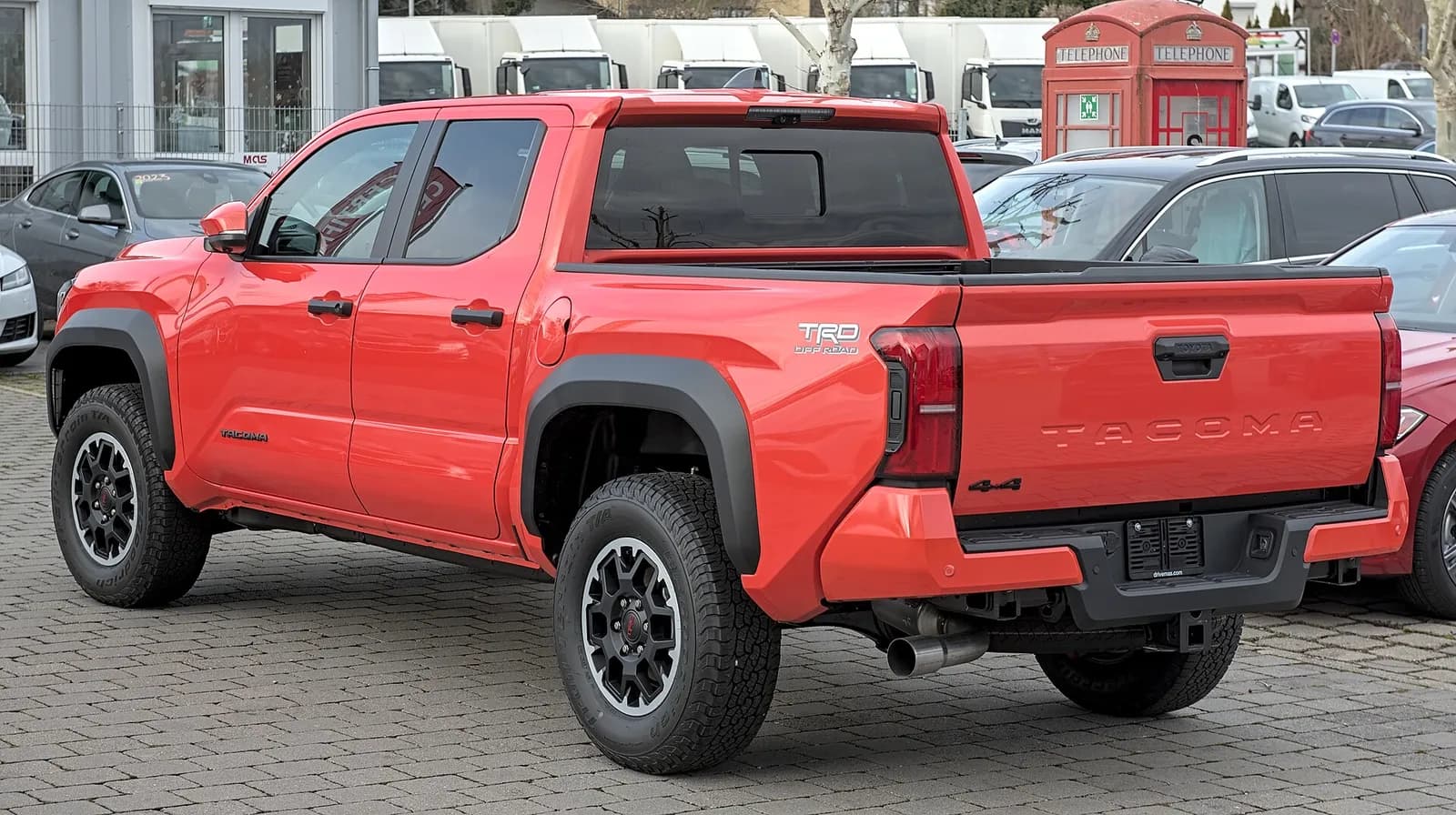 Toyota Tacoma TRD Off-Road (fourth generation) in red, front three-quarter view